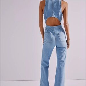 We the people free people jumpsuit. NWT smoke free home size small